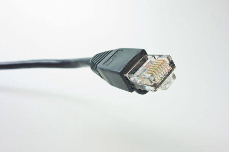 An image of RJ45 wiring inside a patch cable.